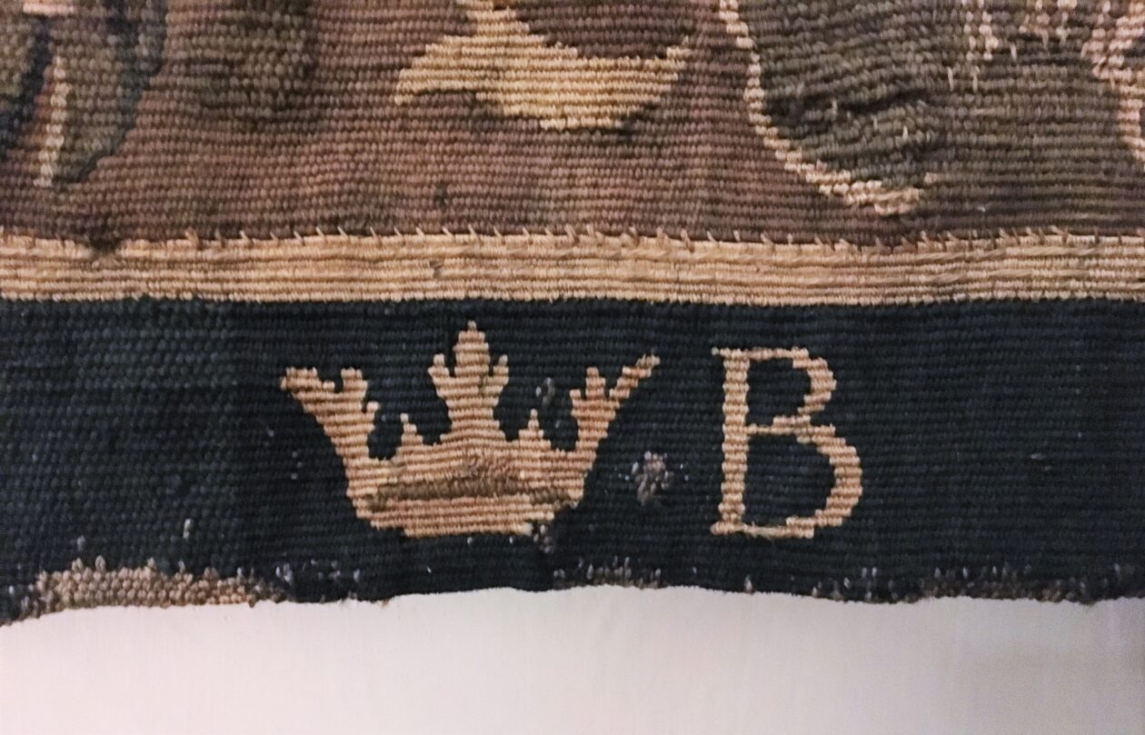Væveriet på Kronborgs logo udformet som en rebus Væveriet på Kronborgs logo udformet som en rebus