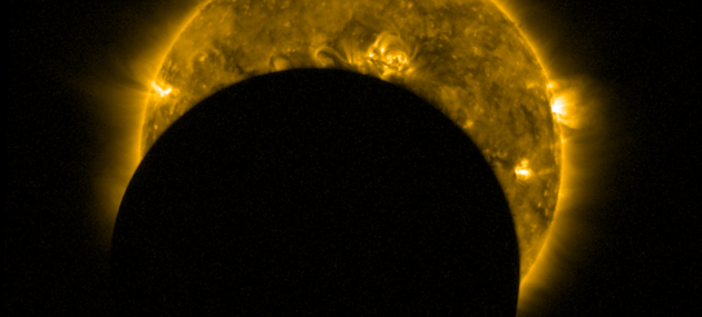 A_partial_solar_eclipse_seen_from_space_pillars